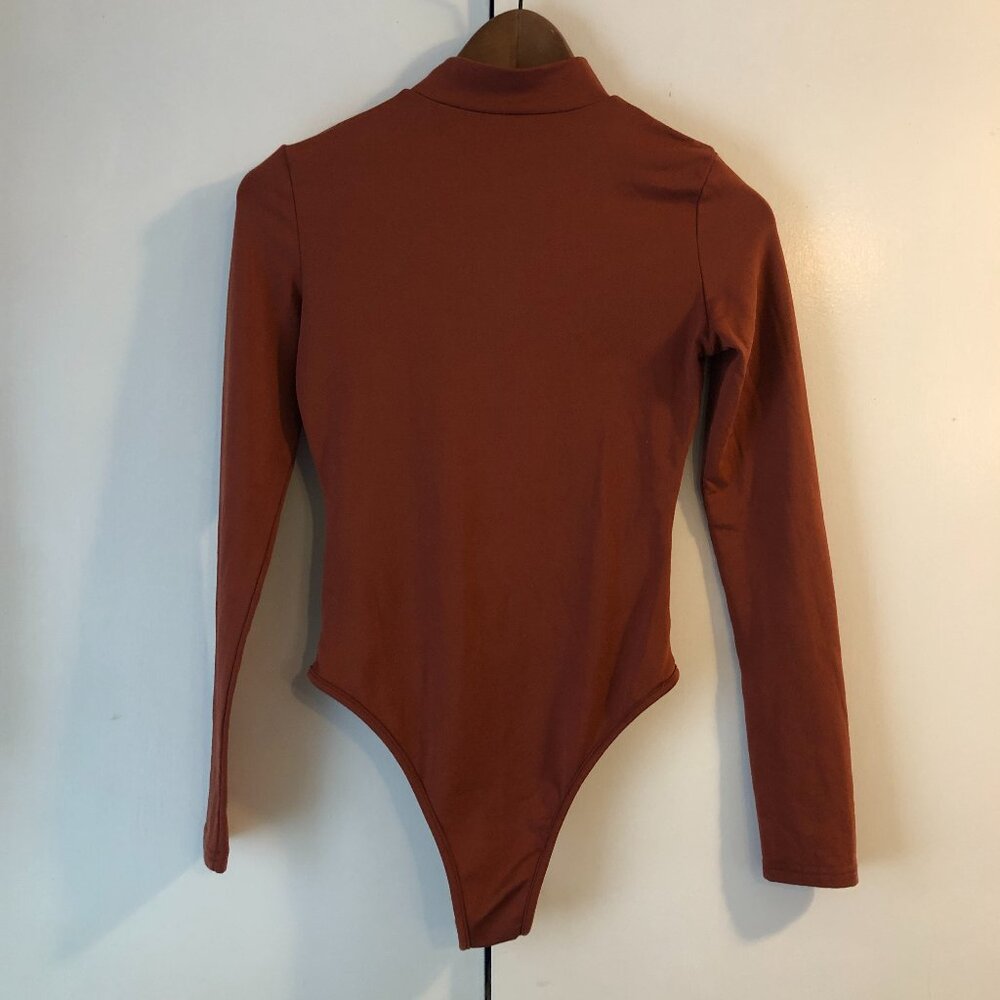 Women's Mock Neck Long Sleeve Solid Stretch Bodysuit in Burnt Orange B85